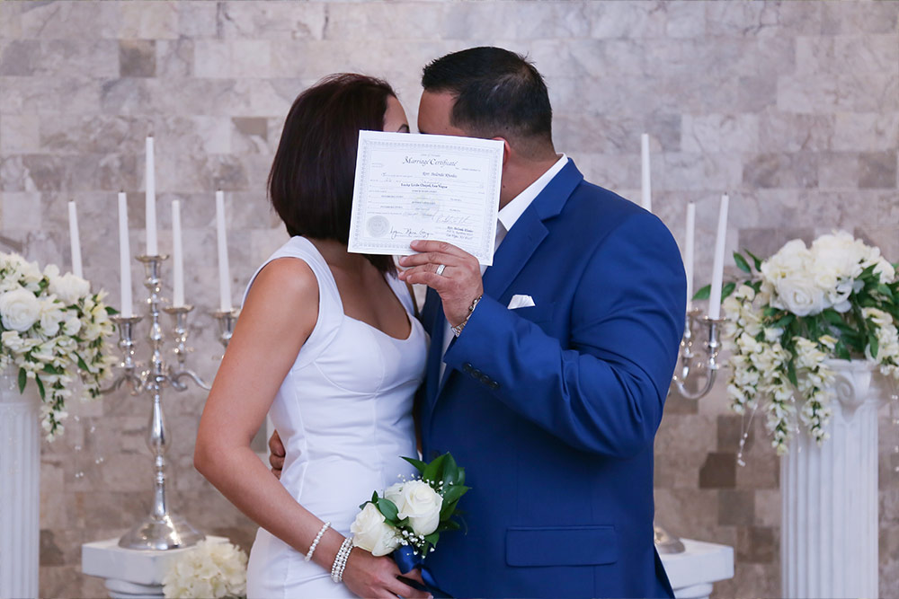 Newly married couple celebrating their special day at Lucky Little Chapel in Las Vegas.